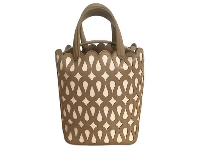 Alaïa Borsa Alaia Bucket in pelle traforata Camel e bianca Cammello
