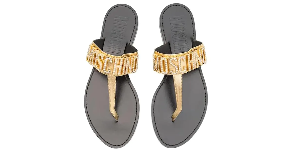 Infradito con logo in cristallo Moschino D'oro