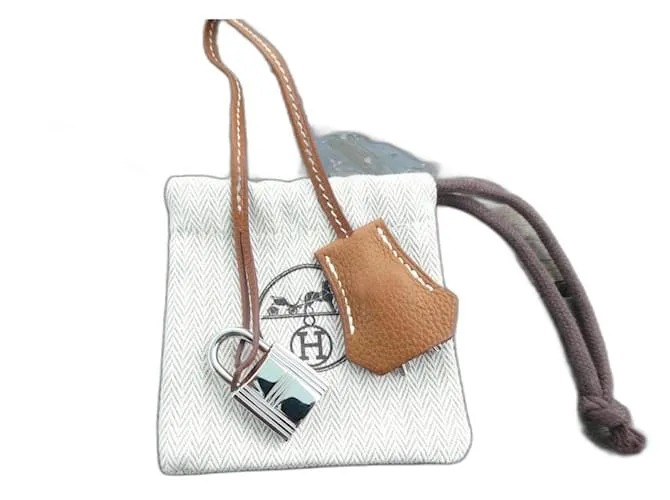 Tirante clochette Hermès con lucchetto 28 cm pelle togo oro kelly birkin Cammello