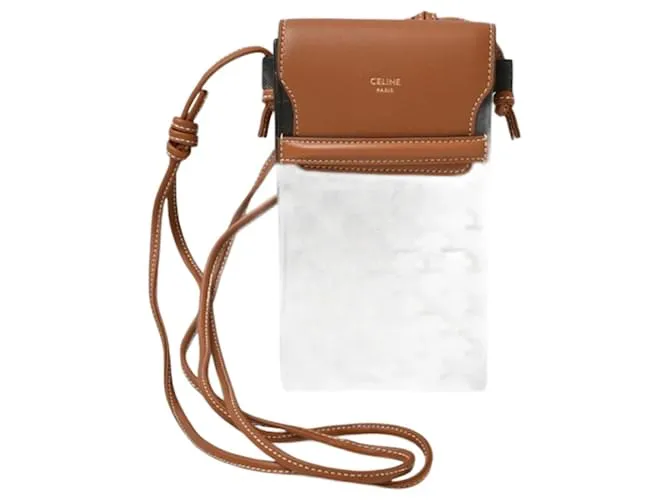 Céline Borsa a spalla Celine Brown per telefono Marrone