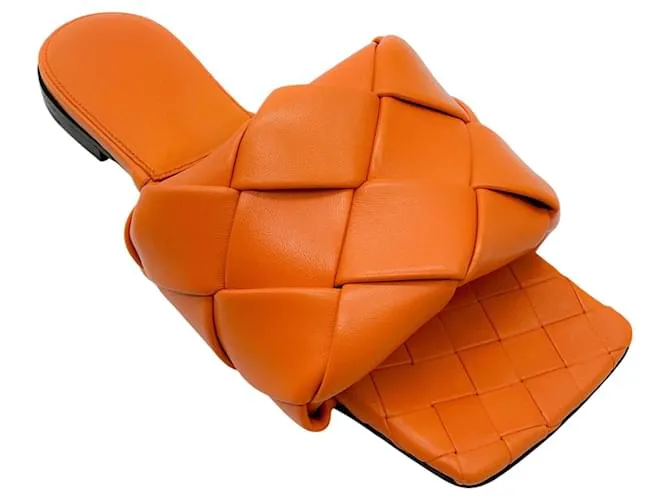Sandali piatti in pelle Intrecciato arancione Lido di Bottega Veneta
