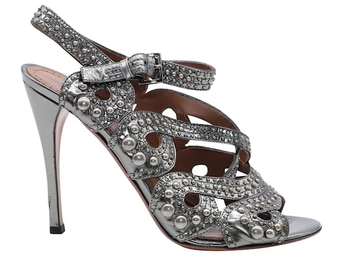 Alaïa Decolleté Alaia con cinturino e borchie in pelle argento Metallico