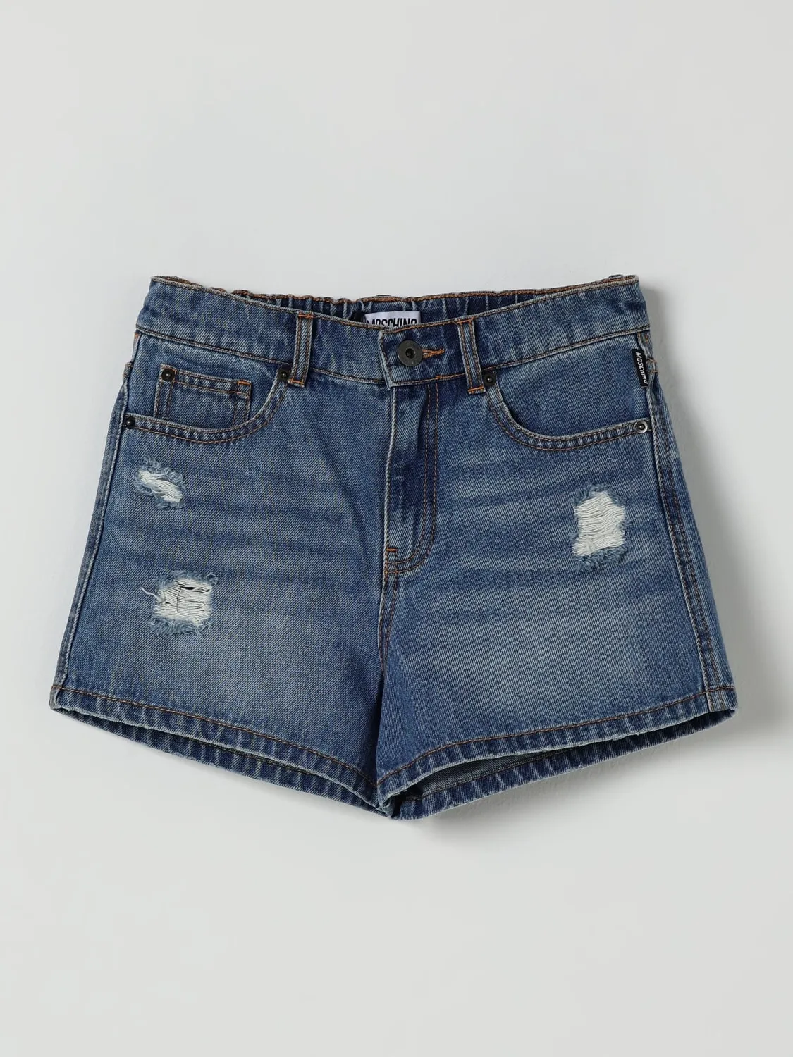 Pantaloncino di jeans con patch Moschino