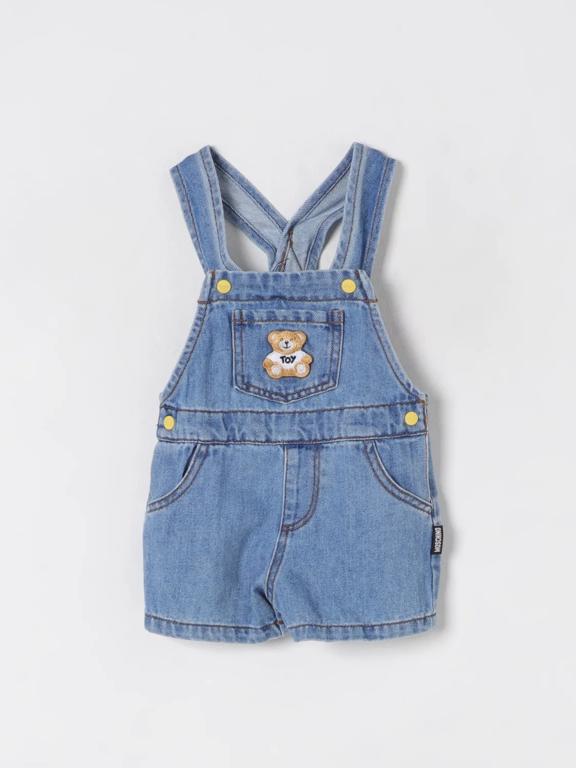 Salopette di jeans con Teddy Moschino