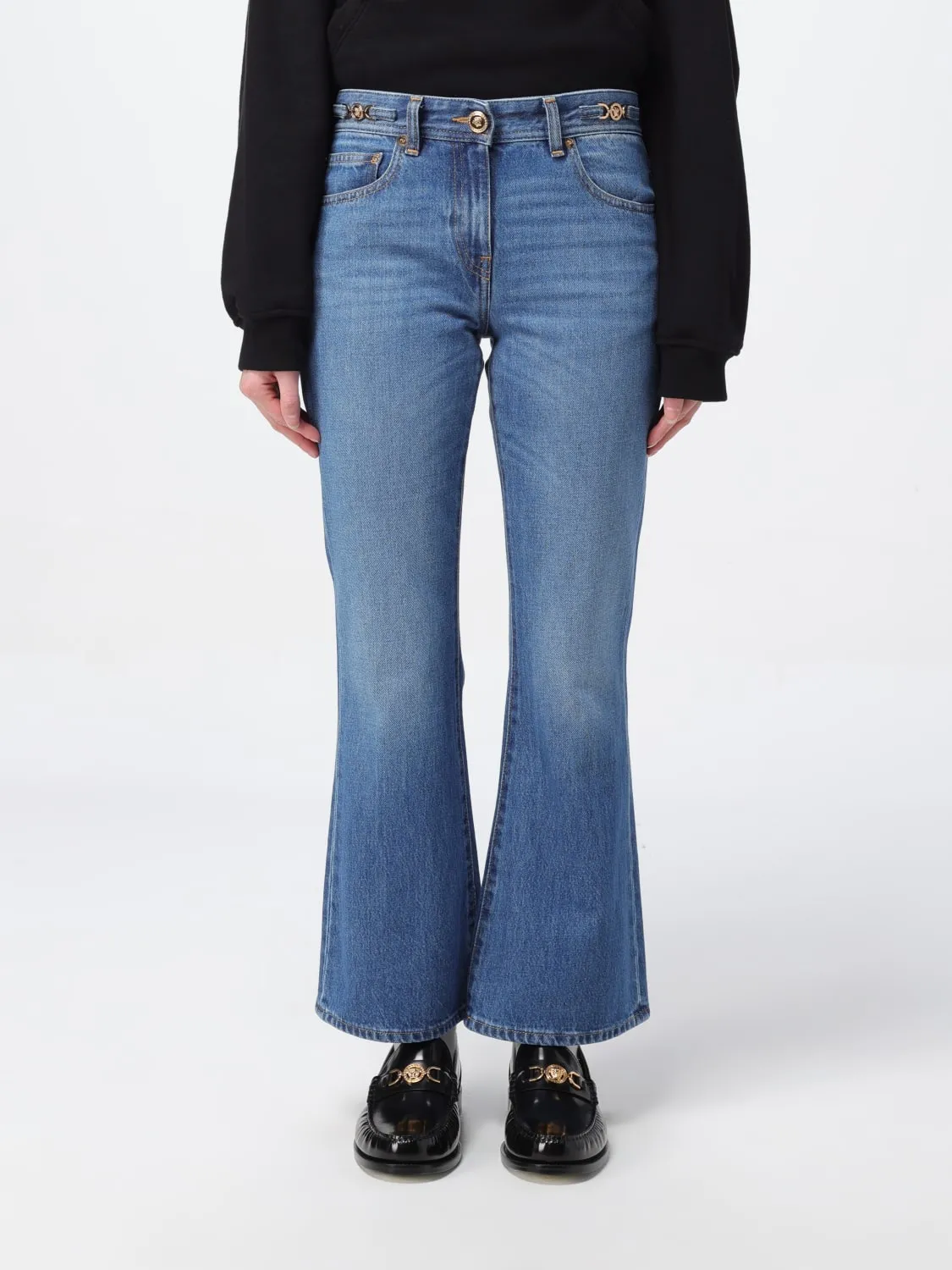 Jeans Versace in denim con morsetto